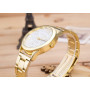 Arany színű fehér számlapos Geneva karóra. 000117oc